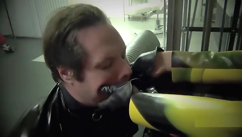 Mature asian hottie with a pair of gloves is having sex with a dude